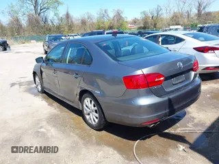 2011 Volkswagen Jetta Sedan SE PZEV with VIN 3VWDZ7AJ0BM306023, listed as a IAAI auction lot 42059241 with 176,879 mi miles. Bid and sale history available at carsss.com. Image 3.