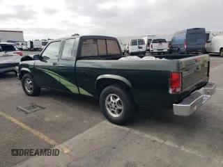 1996 Dodge Dakota z VIN 1B7GL23Y2TS561862, wystawiony jako Copart lot #72455804 z przebiegiem 110 601 mil mil oraz Szkoda całkowita • Salvage title. Historia ofert i sprzedaży dostępna na DreamBid. Obrazek 2.