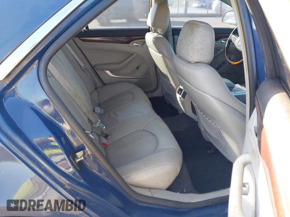 2009 Cadillac CTS AWD with VIN 1G6DT57V290143815, listed as a IAAI auction lot 42000863 with 139,340 mi miles and . Bid and sale history available at DreamBid. Image 8.