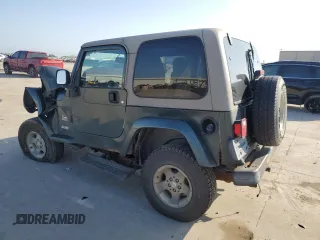 2003 Jeep Wrangler Sahara with VIN 1J4FA59S93P376775, listed as a Copart auction lot 53979415 with 93,995 mi miles and Salvage title. Bid and sale history available at DreamBid. Image 2.
