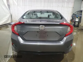 2017 Honda Civic Sedan LX with VIN 19XFC2F50HE204199, listed as a Copart auction lot 52629635 with 42,897 mi miles and Salvage Title. Bid and sale history available at carsss.com. Image 6.