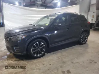 2016 Mazda CX-5 Grand Touring with VIN JM3KE4DY6G0655802, listed as a Copart auction lot 43820475 with 76,639 mi miles and Salvage Title. Bid and sale history available at carsss.com. Image 1.