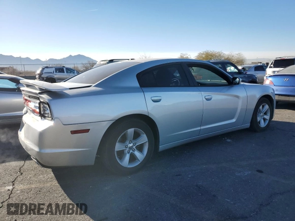 2012 Dodge Charger SE with VIN 2C3CDXBG7CH214766, listed as a Copart auction lot 42142695 with 163,208 mi miles and Salvage Title. Bid and sale history available at DreamBid. Image 3.
