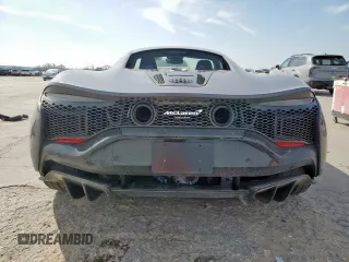 2024 McLaren Artura z VIN SBM16AEA3RW002188, wystawiony jako Copart lot #45177415 z przebiegiem 3440 mil mil oraz Szkody całkowita. Historia ofert i sprzedaży dostępna na DreamBid. Obrazek 6.