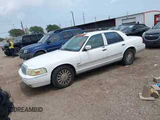 2009 Mercury Grand Marquis LS with VIN 2MEHM75V99X623036, listed as a IAAI auction lot 42087957 with 208,652 mi miles. Bid and sale history available at carsss.com. Image 2.