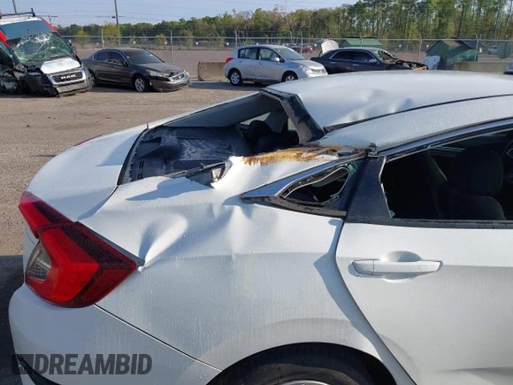 2020 Honda Civic LX with VIN 19XFC2F62LE212421, listed as a IAAI auction lot 41909995 with 46,312 mi miles and . Bid and sale history available at DreamBid. Image 17.