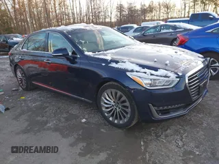 2018 Genesis G90 3.3T Premium with VIN KMHG34JA5JU043341, listed as a IAAI auction lot 41272841 with 33,527 mi miles. Bid and sale history available at carsss.com. Image 1.