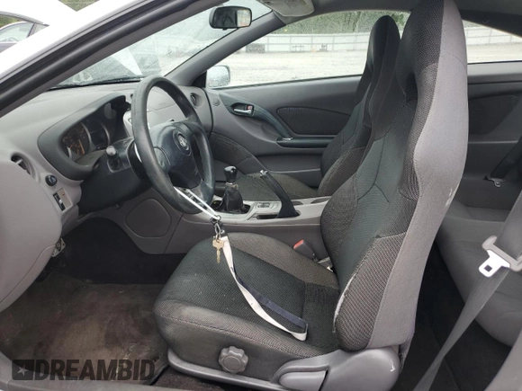 2000 Toyota Celica GT with VIN JTDDR32T9Y0037253, listed as a Copart auction lot 58602215 with Not provided miles and Salvage title. Bid and sale history available at DreamBid. Image 7.