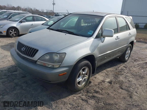 2000 Lexus RX 300 with VIN JT6HF10UXY0112771, listed as a IAAI auction lot 41793188 with 213,484 mi miles and . Bid and sale history available at DreamBid. Image 2.