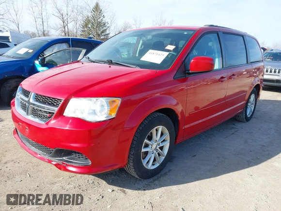 2014 Dodge Grand Caravan SXT with VIN 2C4RDGCG8ER245316, listed as a IAAI auction lot 41871425 with 150,361 mi miles and . Bid and sale history available at DreamBid. Image 2.