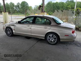 2003 Jaguar S-Type z VIN SAJEA01U53HM58399, wystawiony jako Copart lot #62006044 z przebiegiem 86 841 mil mil oraz Szkoda całkowita • Salvage title. Historia ofert i sprzedaży dostępna na DreamBid. Obrazek 2.