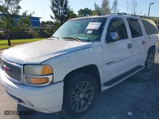 2006 GMC Yukon XL Denali with VIN 1GKFK66U56J142191, listed as a IAAI auction lot 41862921 with 147,655 mi miles. Bid and sale history available at carsss.com. Image 2.