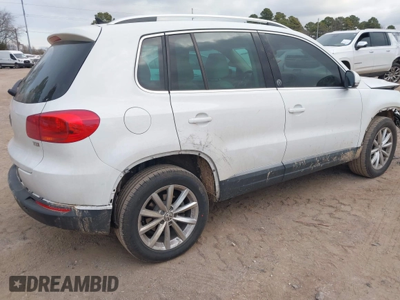 2017 Volkswagen Tiguan Wolfsburg Edition with VIN WVGRV7AX5HK019734, listed as a IAAI auction lot 41391911 with 123,005 mi miles and . Bid and sale history available at DreamBid. Image 4.