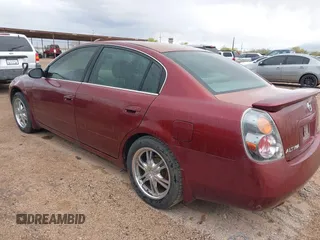 2002 Nissan Altima SE with VIN 1N4BL11E12C103029, listed as a IAAI auction lot 41953119 with 150,499 mi miles. Bid and sale history available at carsss.com. Image 3.