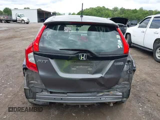 2015 Honda Fit LX z VIN 3HGGK5H59FM714352, wystawiony jako IAAI lot #42156097 z przebiegiem 103 587 mil mil oraz . Historia ofert i sprzedaży dostępna na DreamBid. Obrazek 16.