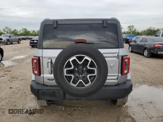 2024 Ford Bronco Outer Banks z VIN 1FMDE8BH6RLA98169, wystawiony jako Copart lot #51036615 z przebiegiem 3 859 mil mil oraz Szkoda całkowita • Salvage title. Historia ofert i sprzedaży dostępna na DreamBid. Obrazek 6.