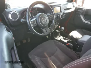 2014 Jeep Wrangler Rubicon with VIN 1C4BJWCG9EL285532, listed as a Copart auction lot 56548325 with 100,032 mi miles and Salvage title. Bid and sale history available at DreamBid. Image 8.