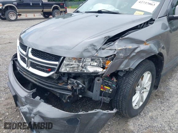2013 Dodge Journey SXT with VIN 3C4PDCBG8DT517733, listed as a IAAI auction lot 42737063 with 67,363 mi miles and . Bid and sale history available at DreamBid. Image 6.