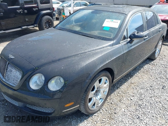 2006 Bentley Flying Spur z VIN SCBBR53W06C039791, wystawiony jako IAAI lot #42295068 z przebiegiem 48 739 mil mil oraz . Historia ofert i sprzedaży dostępna na DreamBid. Obrazek 6.