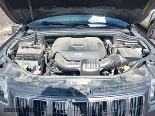 2015 Jeep Grand Cherokee Laredo with VIN 1C4RJFAG2FC133806, listed as a IAAI auction lot 41732455 with 67,955 mi miles. Bid and sale history available at carsss.com. Image 10.