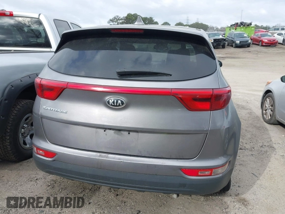 2017 Kia Sportage LX with VIN KNDPMCAC2H7236875, listed as a IAAI auction lot 41704229 with 183,094 mi miles and . Bid and sale history available at carsss.com. Image 16.