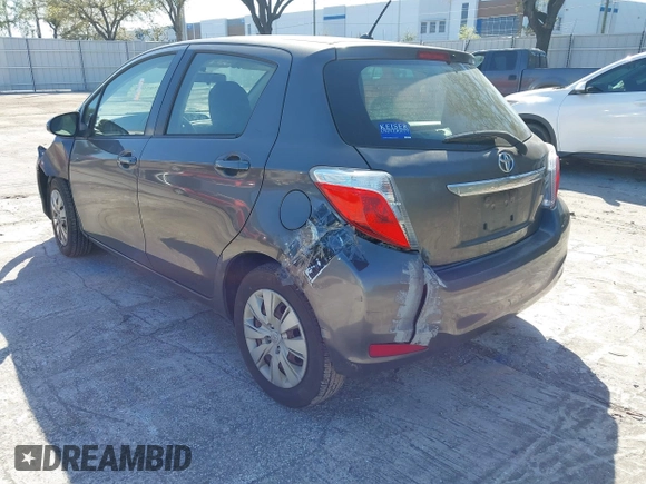 2014 Toyota Yaris L with VIN JTDKTUD35ED596329, listed as a IAAI auction lot 41705004 with 191,557 mi miles. Bid and sale history available at carsss.com. Image 3.