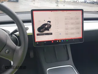 2023 Tesla Model 3 with VIN 5YJ3E1EA0PF587656, listed as a IAAI auction lot 41489586 with 12,844 mi miles and . Bid and sale history available at DreamBid. Image 19.