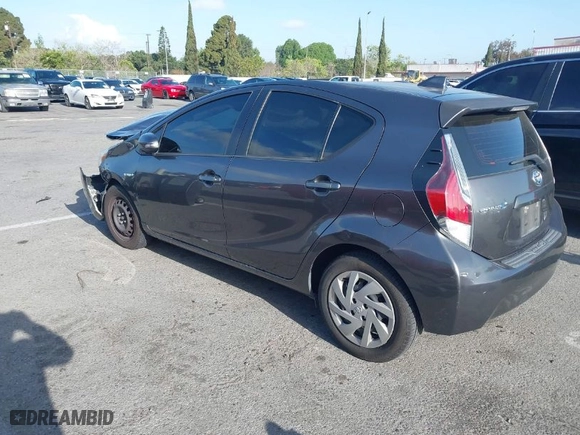 2015 Toyota Prius c One with VIN JTDKDTB33F1585004, listed as a IAAI auction lot 41950129 with 209,233 mi miles. Bid and sale history available at carsss.com. Image 3.