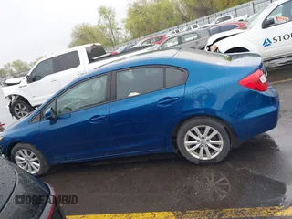 2012 Honda Civic EX with VIN 2HGFB2F89CH537142, listed as a IAAI auction lot 42024927 with 123,063 mi miles and . Bid and sale history available at DreamBid. Image 15.