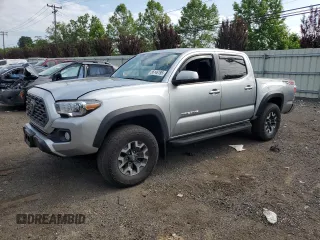 2023 Toyota Tacoma SR z VIN 3TMCZ5ANXPM555443, wystawiony jako Copart lot #56146195 z przebiegiem 31 029 mil mil oraz Szkoda całkowita • Salvage title. Historia ofert i sprzedaży dostępna na DreamBid. Obrazek 1.
