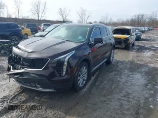 2020 Cadillac XT4 AWD Premium Luxury with VIN 1GYFZDR4XLF085471, listed as a IAAI auction lot 41528080 with 58,136 mi miles. Bid and sale history available at carsss.com. Image 2.