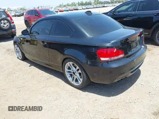 2010 BMW 1 Series 135i with VIN WBAUC7C54AVK80967, listed as a IAAI auction lot 42553077 with Not provided miles and . Bid and sale history available at DreamBid. Image 3.