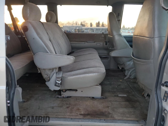 2002 GMC Safari z VIN 1GKDM19XX2B510542, wystawiony jako Copart lot #87019404 z przebiegiem 232 100 mil mil oraz Szkoda całkowita • Salvage title. Historia ofert i sprzedaży dostępna na DreamBid. Obrazek 11.