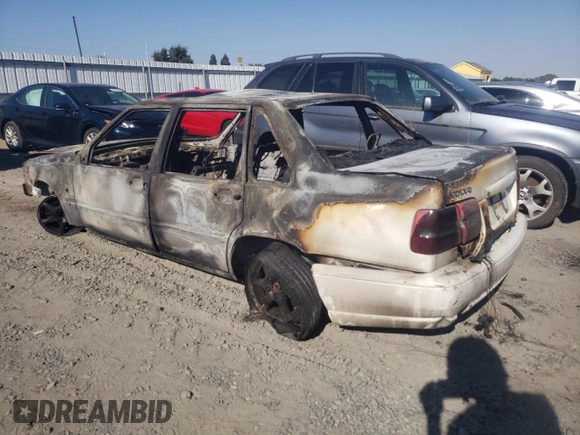 2000 Volvo S70 с VIN YV1LS61J0Y2651057, выставлен на аукционе Copart как лот 69785084 с пробегом Не указан миль и На запчасти • Non repairable. История ставок и продаж доступна на DreamBid. Изображение 2.