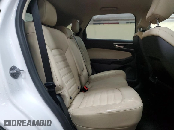 2020 Ford Edge SEL z VIN 2FMPK4J90LBB13748, wystawiony jako Copart lot #65687415 z przebiegiem 108 629 mil mil oraz Czysty tytuł • Clean title. Historia ofert i sprzedaży dostępna na DreamBid. Obrazek 11.