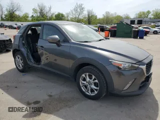2018 Mazda CX-3 Touring z VIN JM1DKDC7XJ0300125, wystawiony jako Copart lot #54553765 z przebiegiem 83 652 mil mil oraz Szkoda całkowita • Salvage title. Historia ofert i sprzedaży dostępna na DreamBid. Obrazek 4.