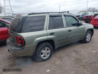 2003 Chevrolet TrailBlazer LT with VIN 1GNDT13S032331673, listed as a IAAI auction lot 42042418 with 220,976 mi miles. Bid and sale history available at carsss.com. Image 4.