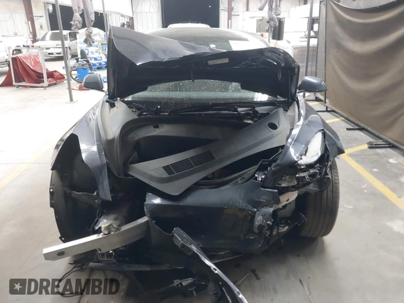 2023 Tesla Model 3 with VIN 5YJ3E1EAXPF669538, listed as a IAAI auction lot 40329679 with 16,612 mi miles and . Bid and sale history available at DreamBid. Image 11.