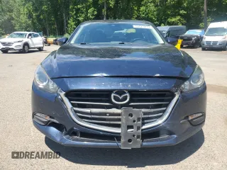 2017 Mazda 3 Touring with VIN JM1BN1V73H1125859, listed as a Copart auction lot 65023235 with 120,300 mi miles and Salvage title. Bid and sale history available at DreamBid. Image 5.