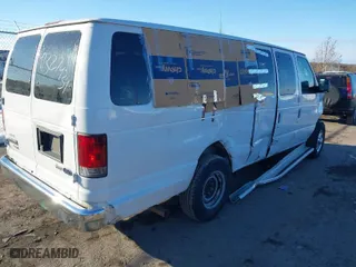 2010 Ford Econoline Wagon XL with VIN 1FBSS3BLXADA00923, listed as a IAAI auction lot 41327434 with 229,175 mi miles. Bid and sale history available at carsss.com. Image 4.
