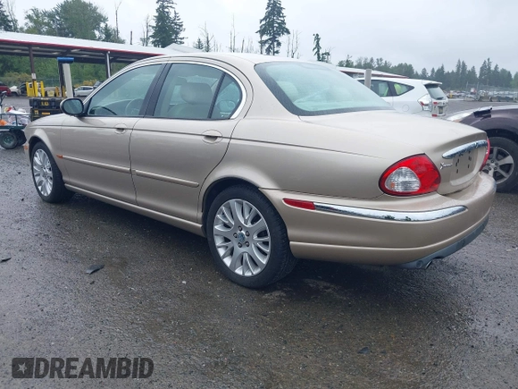 2003 Jaguar X-Type 2.5L Manual z VIN SAJEA51D53XC94089, wystawiony jako IAAI lot #42370566 z przebiegiem 81 687 mil mil oraz . Historia ofert i sprzedaży dostępna na DreamBid. Obrazek 3.