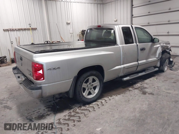 2010 Dodge Dakota with VIN 1D7CW3BP7AS103645, listed as a IAAI auction lot 41514841 with 158,125 mi miles and . Bid and sale history available at DreamBid. Image 4.