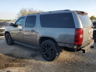 2007 Chevrolet Suburban LS with VIN 1GNFC16097J403193, listed as a Copart auction lot 51236075 with 191,350 mi miles and Salvage title. Bid and sale history available at DreamBid. Image 2.