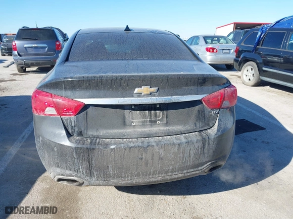 2014 Chevrolet Impala LTZ with VIN 2G1155S31E9105694, listed as a IAAI auction lot 41414595 with 128,828 mi miles. Bid and sale history available at carsss.com. Image 17.