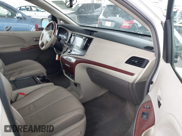 2011 Toyota Sienna XLE AAS with VIN 5TDYK3DC8BS148948, listed as a IAAI auction lot 41806293 with 144,645 mi miles and . Bid and sale history available at DreamBid. Image 5.