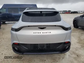 2021 Aston Martin DBX z VIN SCFVUJAW4MTV03930, wystawiony jako Copart lot #73946614 z przebiegiem Nie podano mil oraz Nie do naprawy. Historia ofert i sprzedaży dostępna na DreamBid. Obrazek 6.