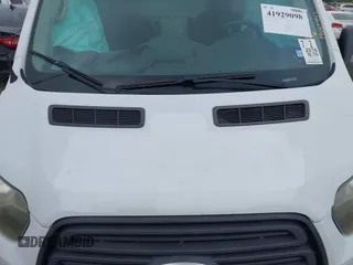 2016 Ford Transit Cargo z VIN 1FTYR1ZM5GKA09697, wystawiony jako IAAI lot #41929098 z przebiegiem 98 790 mil mil oraz . Historia ofert i sprzedaży dostępna na DreamBid. Obrazek 10.