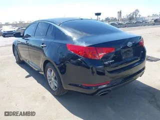 2012 Kia Optima LX with VIN 5XXGM4A71CG082636, listed as a IAAI auction lot 41862116 with 141,753 mi miles. Bid and sale history available at carsss.com. Image 3.