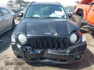 2008 Jeep Compass Sport with VIN 1J8FT47W68D711699, listed as a IAAI auction lot 41794475 with 182,700 mi miles. Bid and sale history available at carsss.com. Image 6.