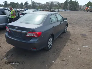 2011 Toyota Corolla L with VIN 2T1BU4EE4BC542333, listed as a IAAI auction lot 42122502 with 100,331 mi miles. Bid and sale history available at carsss.com. Image 4.